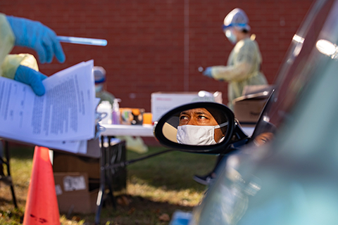A patient listens to instructions from a worker at a pop-up COVID-19 test site conducted at the Rantoul Parks and Recreation Department. The event was one of several pop-up test sites held in the Rantoul community by the Labor Health Equity Action Project, a collaborative initiative involving scientists at the University of Illinois Urbana-Champaign and volunteers.