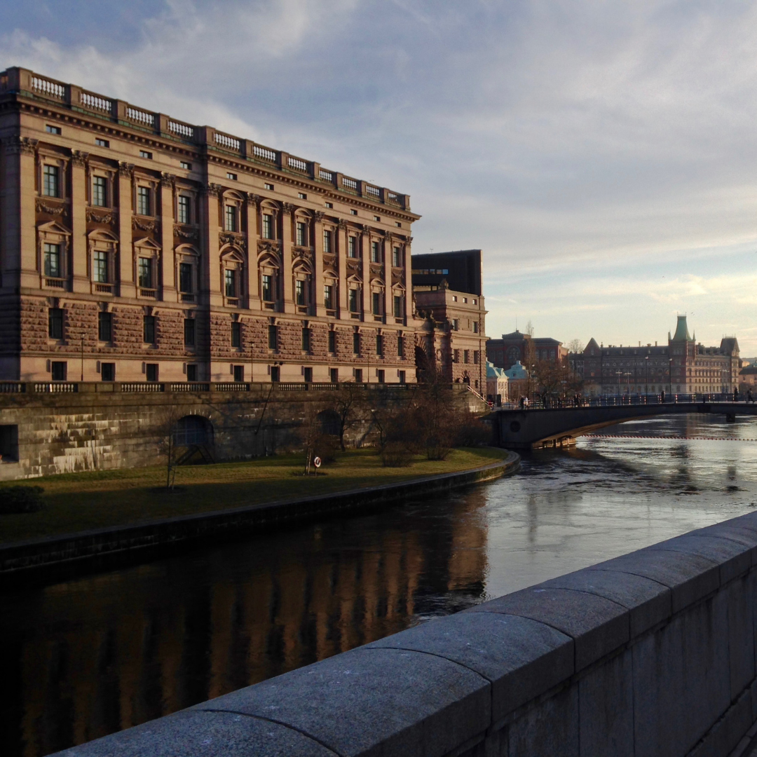 Historic buildings on the waterfront in Stockholm at golden hour. 