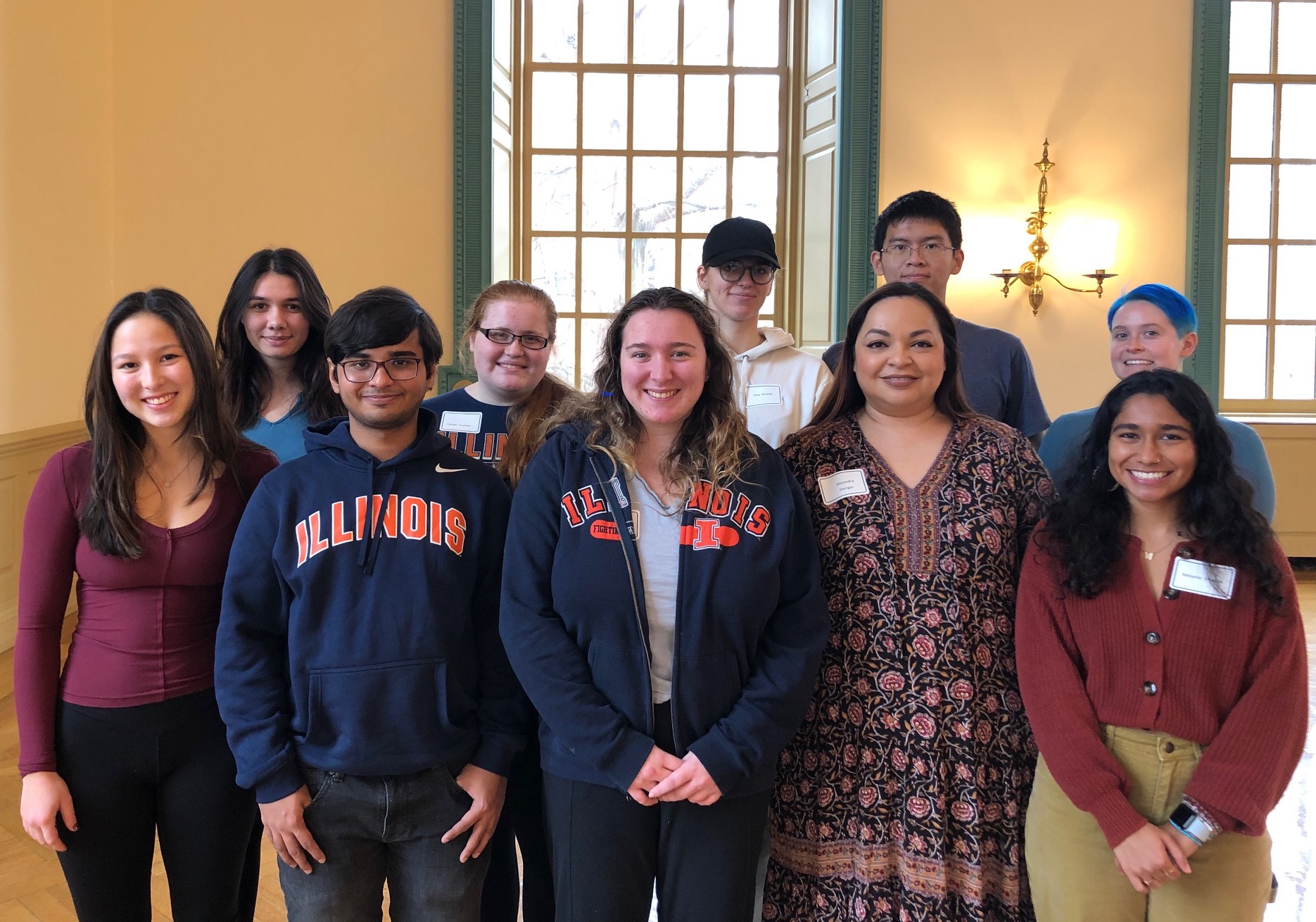 Undergraduate and graduate students participants and mentors with the Merit Program Professional Network Class gather at a year-end celebration in the Illini Union in December 2022.