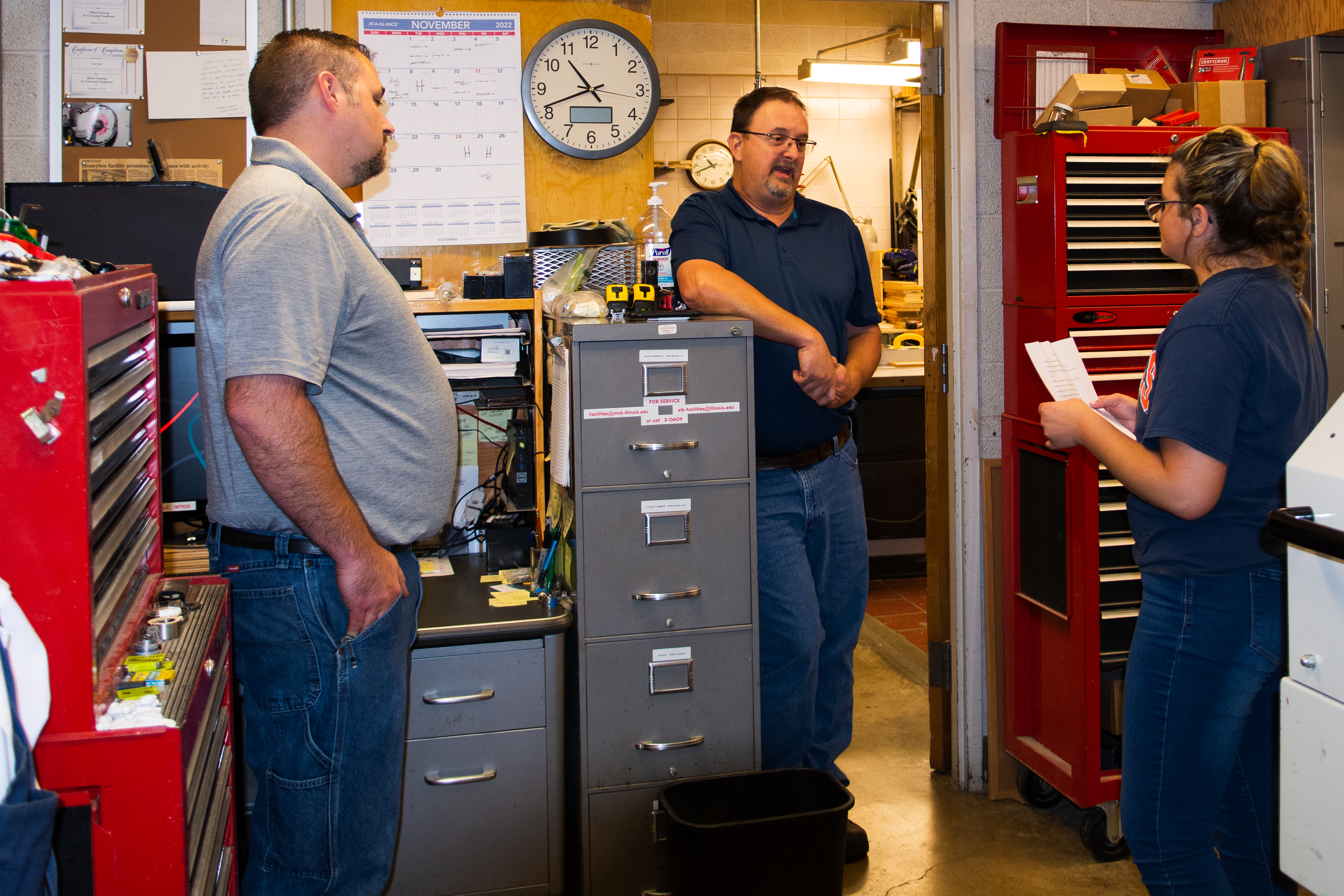 Jared and Scott talk with a student intern