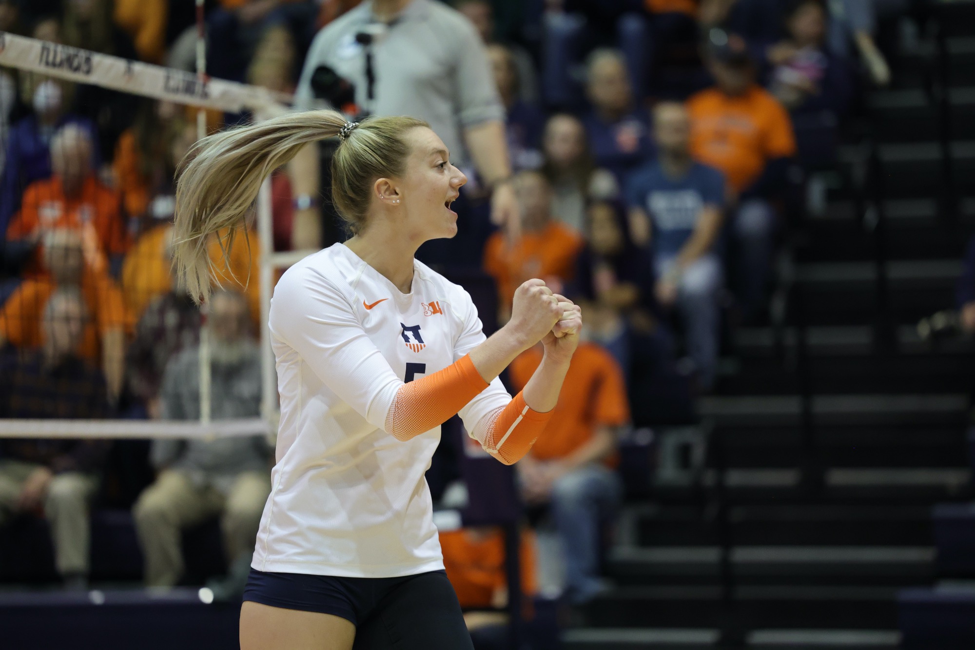 Diana Brown cheers on the volleyball court. 