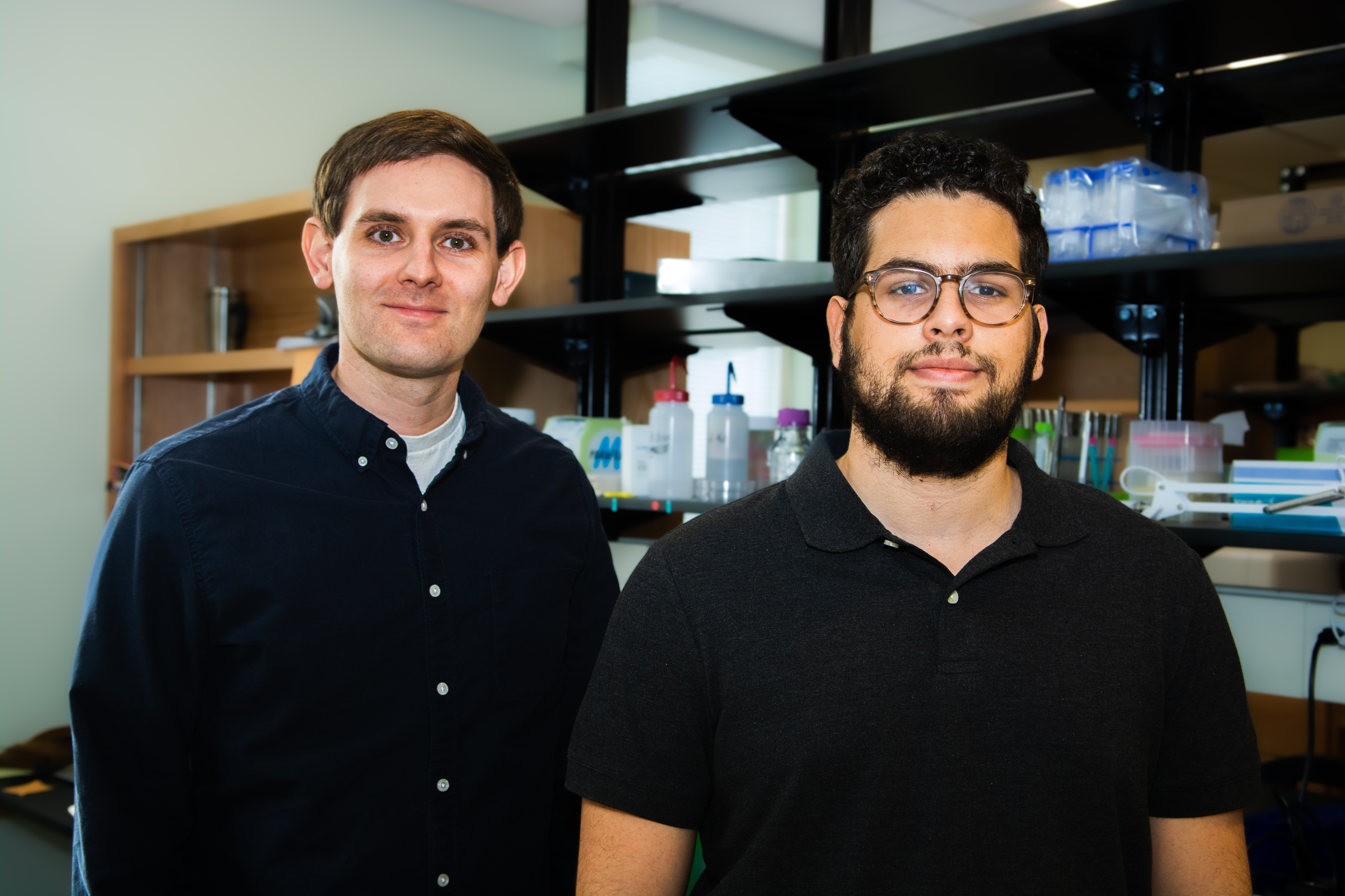 Joe and Gilberto stand together in the lab.