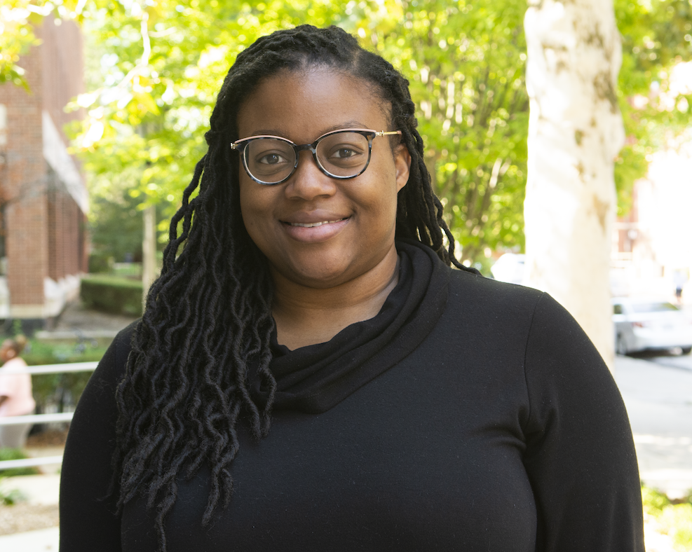 Jhewelle Fitz-Henley stands outside Burrill Hall for headshot