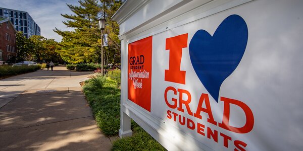 sign saying "I love grad students"
