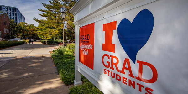 sign saying 'i love grad students'