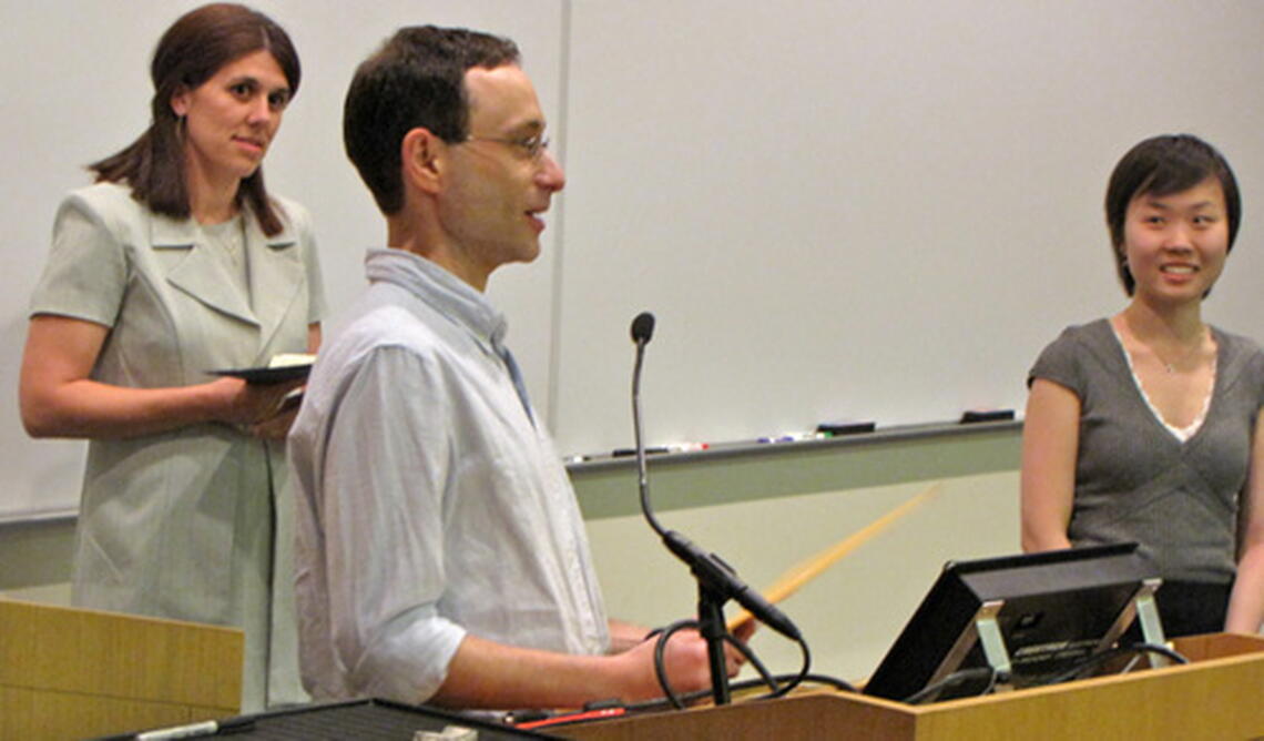 Professor Philip Newmark and Melissa Reedy present Amanda Park with the Roderick MacLeod Award for Excellence