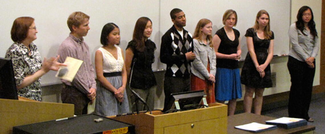 Shawna Naidu presents students graduating with a Concentration in Molecular & Cellular Biology Honors with a pin to wear on their graduation robes