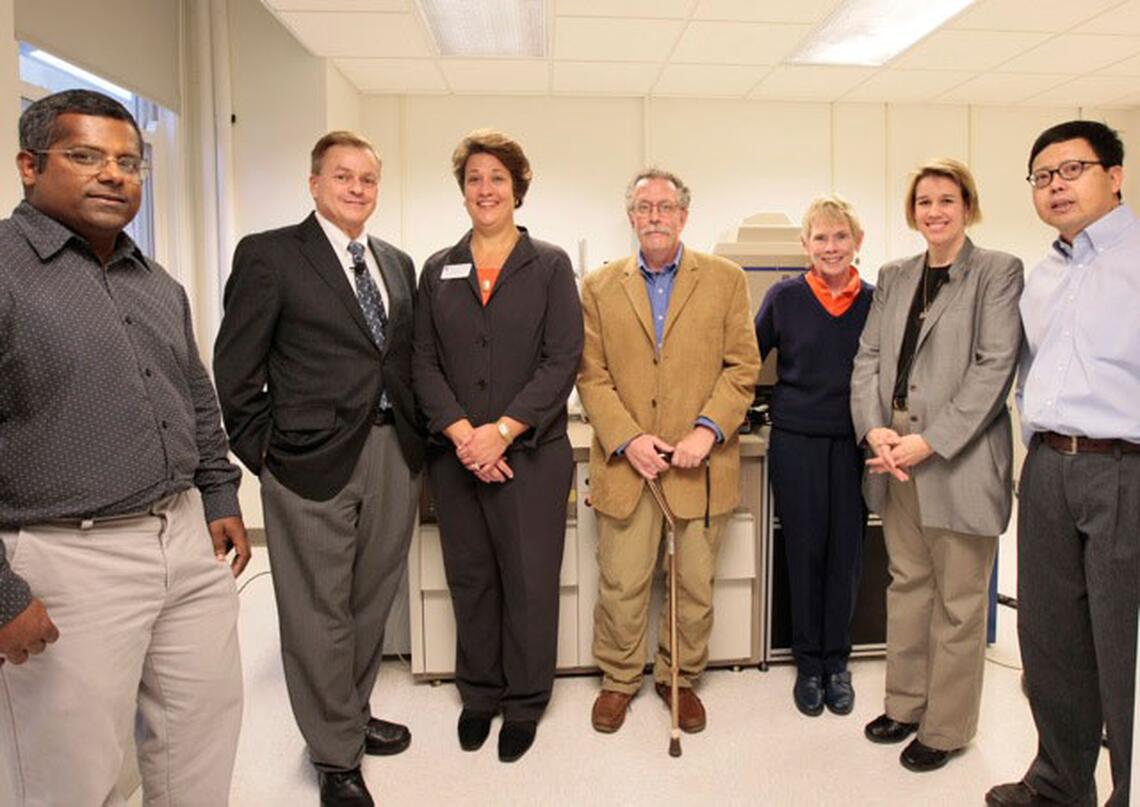 Scientists pose together in the new facility. 