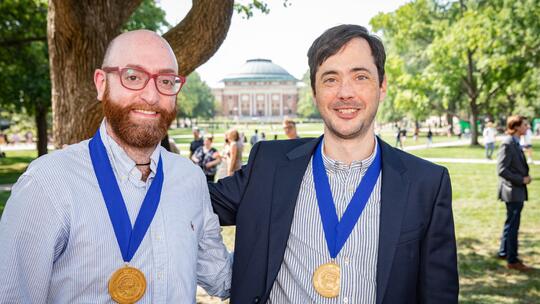 Some of the SHIELD team leaders, from left: Fadi Alnaji, postdoctoral researcher focusing on virology, and Christopher Brooke, associate professor of microbiology. They're wearing Presidential Medallion, the highest honor that the University of Illinois System president can bestow.