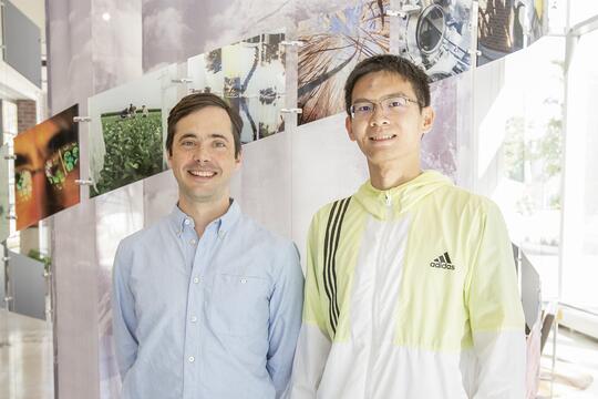 Chris Brooke, an associate professor of microbioly (left) with lead author and graduate student Tongyu Liu