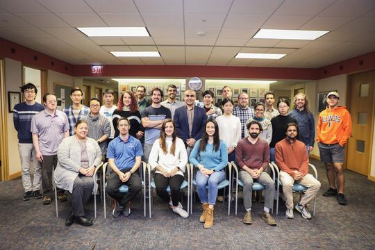 Members of the Tajkhorshid lab assemble for a group photo.