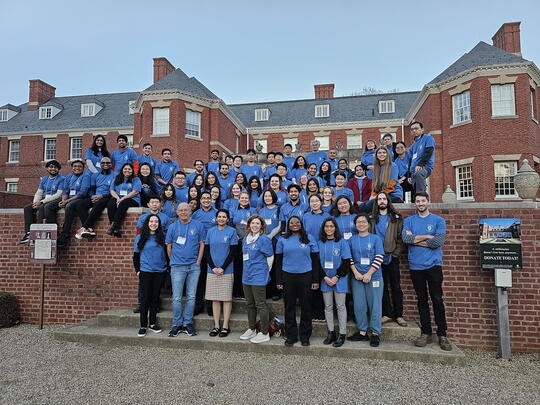 attendees of the CDB 2023 retreat gather on steps outside the Allerton mansion