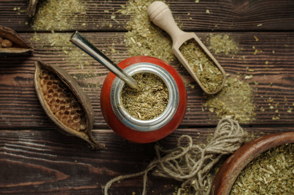 bowl and scoop of dried yerba mate