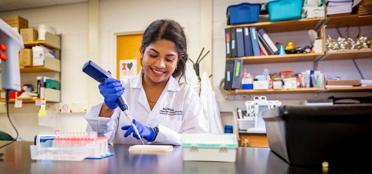 PhD student at lab bench