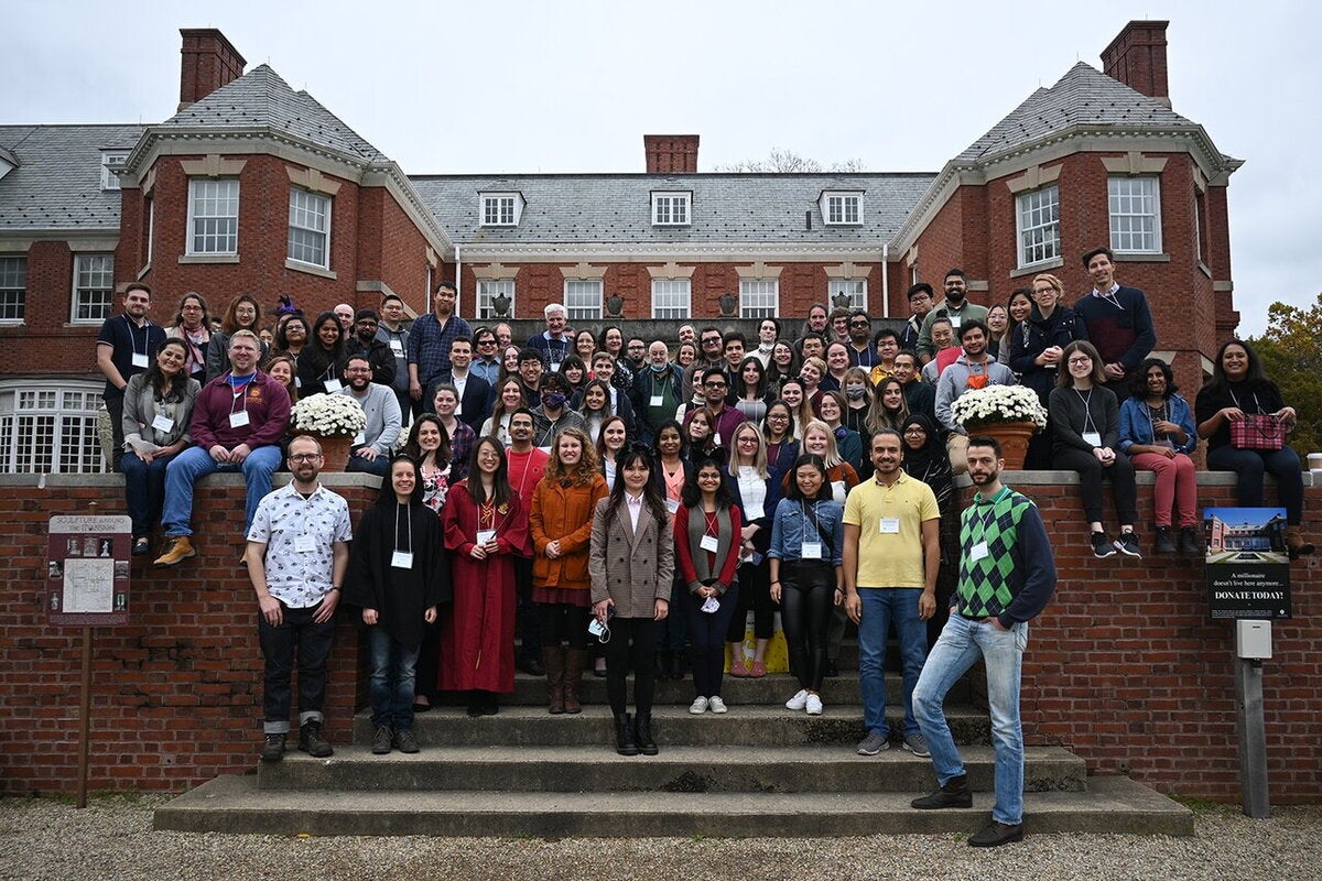 microbiology faculty and staff gather outside allerton mansion in 2021