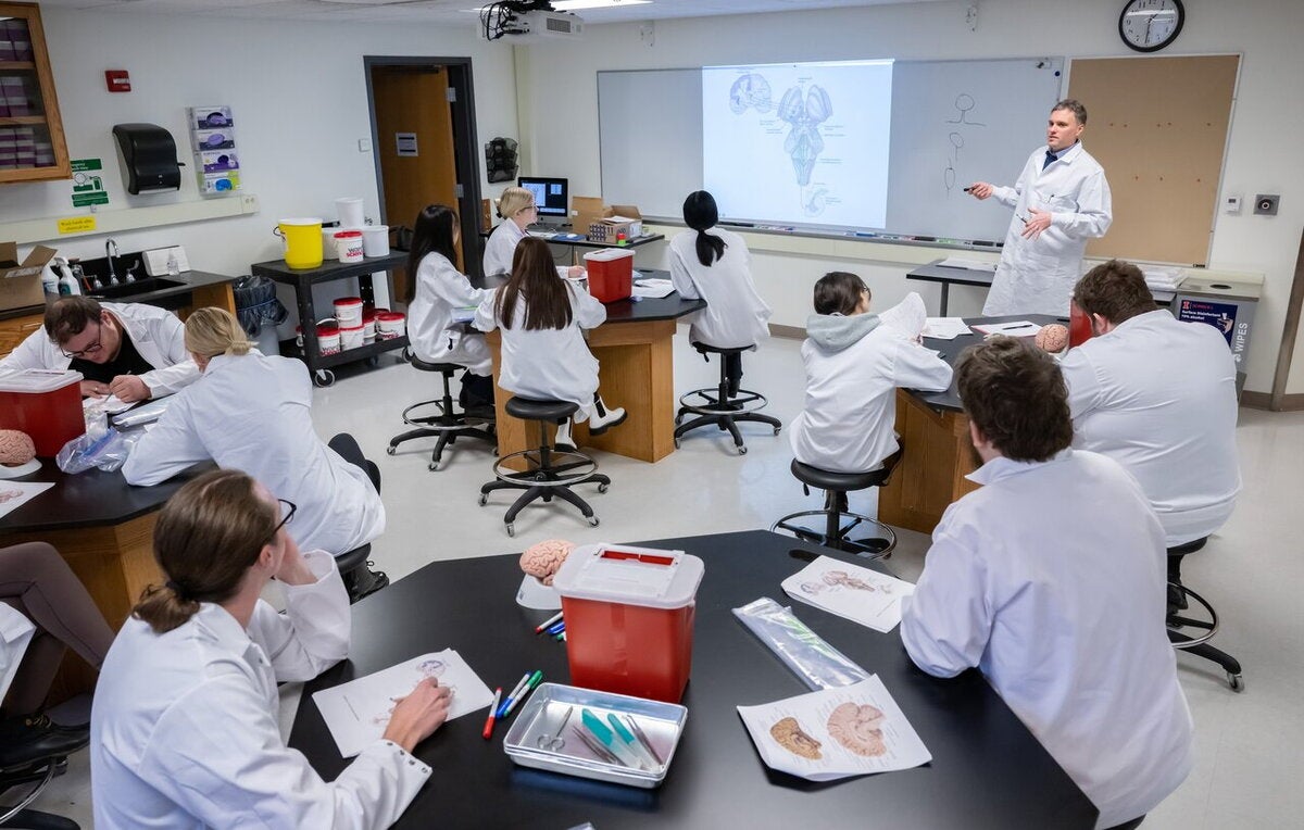 students listen to neuroscience lecturer