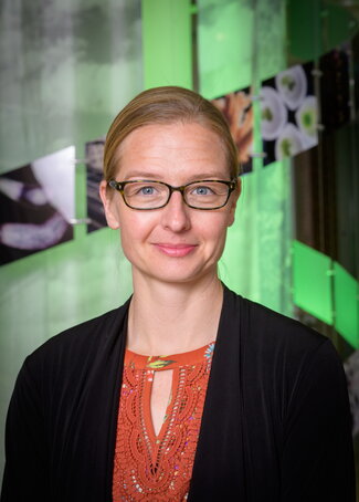 Beth Stadtmueller in the IGB atrium, Photo by Fred Zwicky, University of Illinois