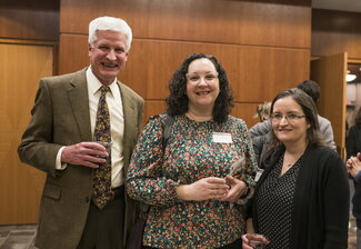 Professors Jim Slauch, Cari Vanderpool and Asma Hatoum Aslan smile for the camera. 