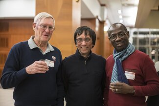 Professors Roderick Mackie, Milan Bagchi and Isaac Cann smile together for a group photo. 
