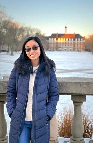 Emily Vo stands on the Quad