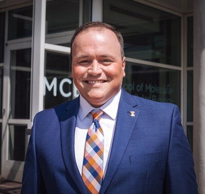 Ryan Pea stands outside the Chemical and Life Sciences Laboratory