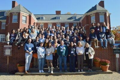 researchers gather outside of allergen