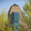 Exterior photo of Beckman Institute in summertime