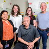 Researchers from the University of Illinois Urbana-Champaign who worked on a CAR-T immune therapy gather in a lab for a photo. Pictured, from front left: postdoctoral researcher Diana Rose Ranoa, graduate student Claire Schane, professor emeritus of biochemistry David Kranz (front center), researcher Amber Lewis and professor emeritus of pathology Edward Roy.