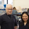 Steven Blanke and Ami Seeger stand in front of a lab bench in Burrill Hall in October 2023.