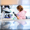 Graduate student at work in biochemistry lab