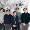 Researchers assemble in atrium of IGB.