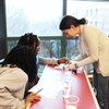 Nicole Godellas leads an outreach session with elementary school students.