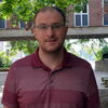 Patrick Sweeney stands outside Burrill Hall.