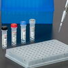 Four vials stand upright beside a Water SARS-CoV-2 RT-PCR Test