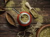 bowl and scoop of dried yerba mate